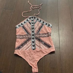 Never worn light pink body suit